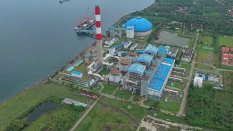 Aerial view of a large coal fired power plant on bali coast Stock Footage 328915242