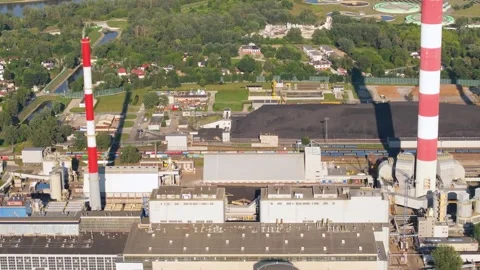 Aerial view of a large coal fired power plant complex Vídeo Stock 344879507