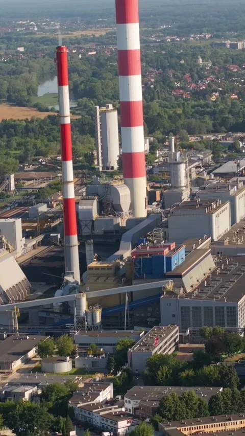 Aerial view of a large coal fired power plant. Vertical video Stock Footage 345654078