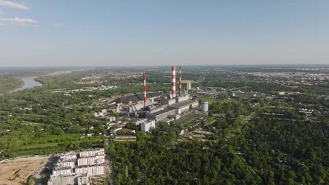 Aerial view of a large coal fired power plant complex Stock Footage 345685882