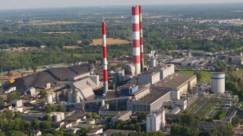 Aerial view of a large coal fired power plant and chimneys Stock Footage 345685895