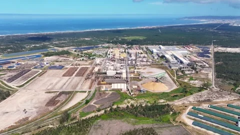 Aerial view of a large coastal pulp mill and biomass power plant Stock Footage 340311794