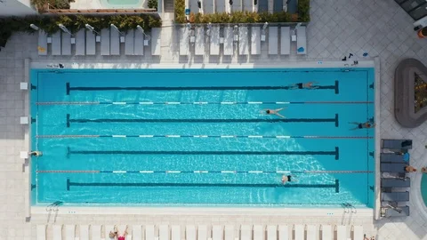 Aerial view of a large complex for swimming and sports with many pools Stock Footage 106375629
