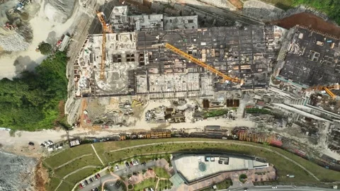 Aerial View of Large Construction Site with Machinery and Building Materials Stock Footage 316450429