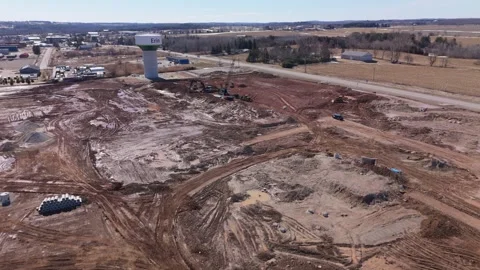 Aerial View Of Large Construction Site In Erin Ontario With Water Tower Видео 332954102