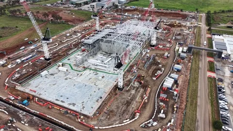 Aerial view of a large construction site with cranes Vidéo 340502930