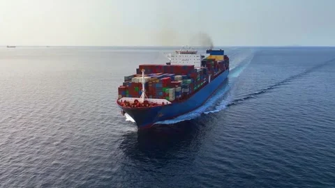 Aerial view of a large container cargo ship traveling over calm ocean Stock Footage 262071909