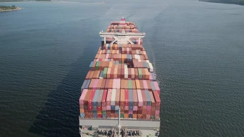 Aerial view of a large container ship entering the port Stock Footage 248077763
