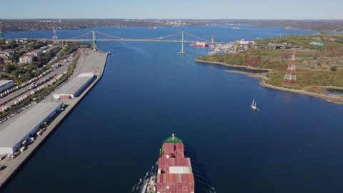 Aerial View Large Container Vessel Arriving In Halifax Port Under Bridge Stock Footage 318625196