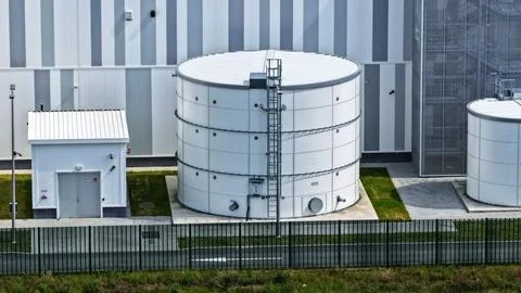 Aerial View of Large Cylindrical Storage Tank at Data Center Stock Photos