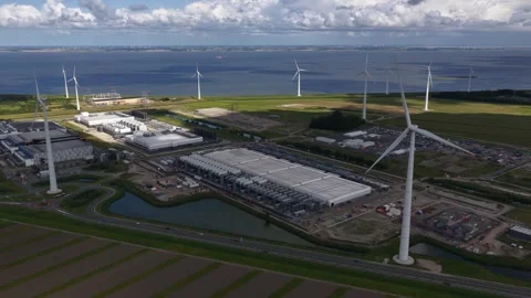 Aerial View of Large Data Center Expansion in Eemshaven Stock Footage 325834417
