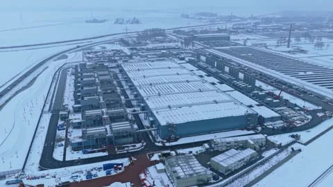Aerial view of a large data center covered in snow Stock Footage 327904505