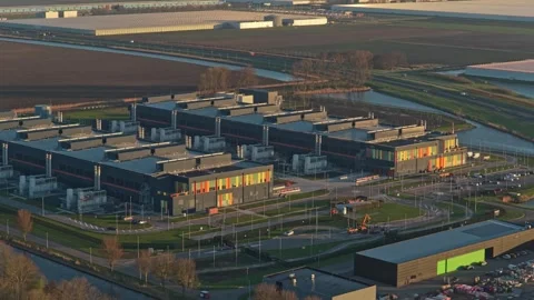 Aerial view of a large data center complex at sunrise Stock Footage 331201314