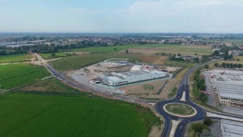 Aerial view of a large data center construction project in Siziano, Italy Stock Footage 342128362