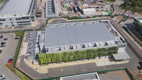 Aerial View of a Large Data Center Facility Showing the Roof Structure and Stock Footage 345681677