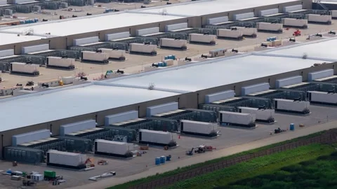 Aerial view of a large data center under construction, close up shot Vídeo Stock 345771648