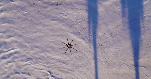 Aerial view of large drone flying from above at the beach on a sunny day. 4K Stock Footage 87188516