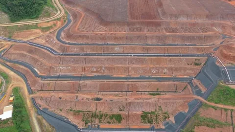 Aerial view of a large earthmoving project site Vídeos de archivo 328919631