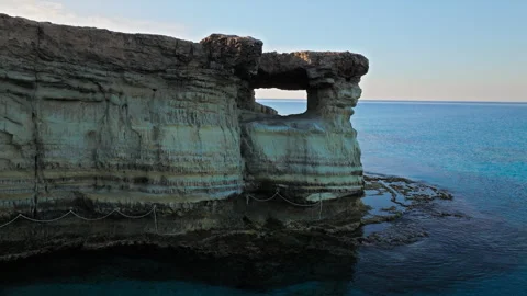 Aerial view of a large eroded sea cave at Cape Cavo Greco in Cyprus. Stock Footage 341540577