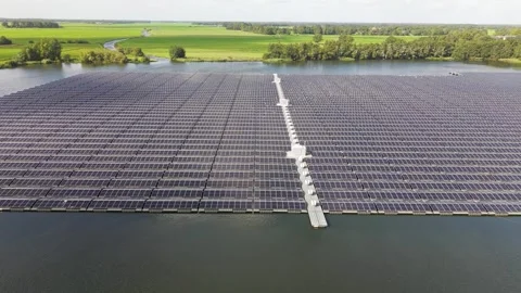 Aerial view of a large floating solar park on a lake in Beilen, Netherlands Stock Footage 346135663