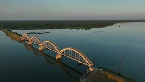 Aerial view. A large four-arch bridge over the river. A beautiful railway bridge Stock Footage 234470539