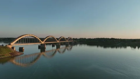 Aerial view. A large four-arch bridge over the river. A beautiful railway bridge Stock Footage 234471681