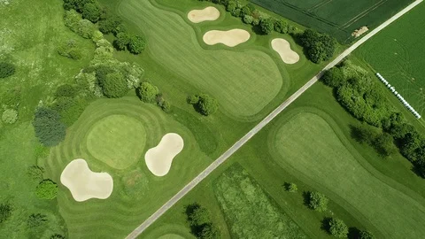 Aerial view of a large golf course Видео 109205982