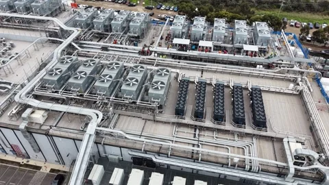 Aerial view of a large industrial datacenter cooling system Video stock 340503414