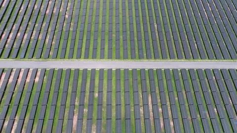 Aerial view large industrial Solar power Energy Farm Stock Footage 76038879
