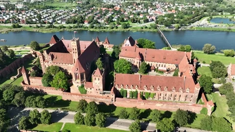Aerial View of Large Medieval Castle Complex by the River-seg10 Stock Footage 328670910