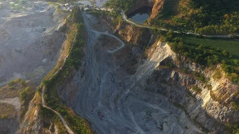 Aerial view of the large mine that exploded the mountains Stock Footage 119914785