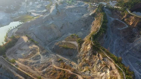 Aerial view of the large mine that exploded the mountains Stock Footage 119914930