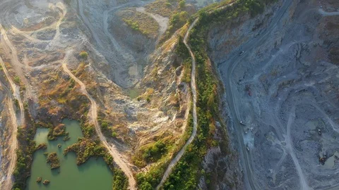 Aerial view of the large mine that exploded the mountains  Stock Footage 121409553