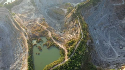 Aerial view of the large mine that exploded the mountains for the mining  Stock Footage 127426810