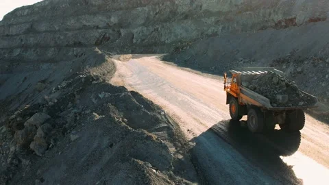  Aerial view of large mining trucks on a gold mine. Open pit mine quarrying Stock-Footage 164388051