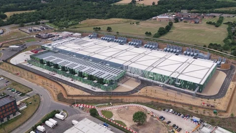 Aerial View of a Large Modern Data Center Facility During Daylight Hours in Stock Footage 342077399