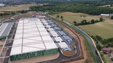 Aerial View of a Large Modern Data Center Facility During a Bright Sunny Stock Footage 342077655