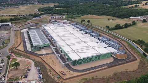 Aerial View of a Large Modern Data Center Facility During a Bright Summer Stock Footage 342077814