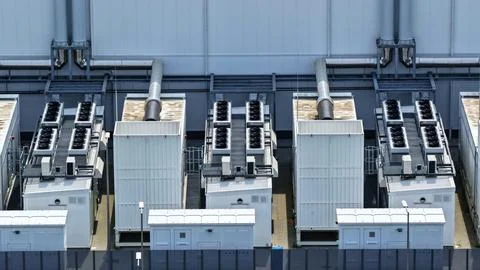 Aerial View of Large Modern Data Center with Rooftop Cooling Systems Stock Photos