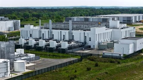 Aerial View of Large Modern Data Center in Green Landscape Stock Photos