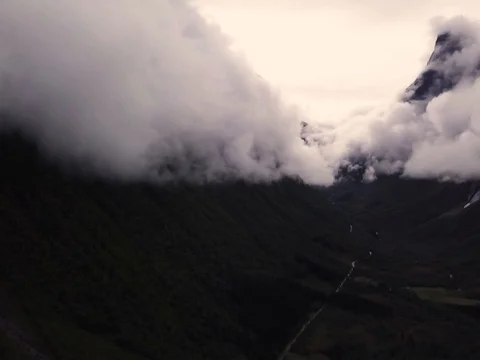 Aerial View of Large Mountain Covered in Fog, Trees, Forest in Norway Видео 82981077