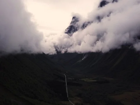 Aerial View of Large Mountain Covered in Fog, Trees, Forest in Norway Stock Footage 82981083