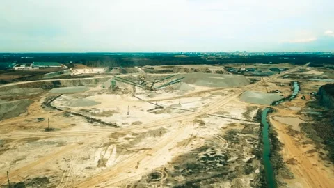 Aerial View of a Large Open Pit Mine Quarry and Processing Equipment Stock Footage 334351316