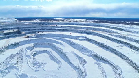 Aerial view of a large open pit mine quarry during winter Stock Footage 337021841