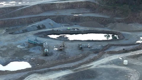 Aerial view of a large open-pit mining quarry Vidéo 342509856