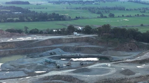 Aerial view of a large open-pit quarry with machinery Vídeos de archivo 342512413