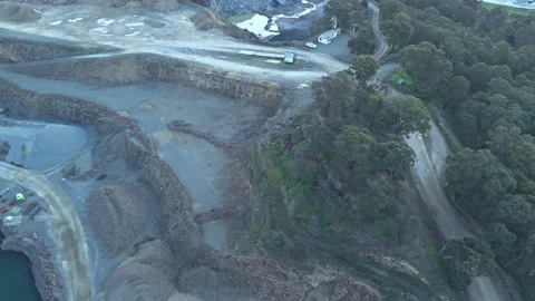 Aerial view of a large open-pit mining quarry Video stock 342514601