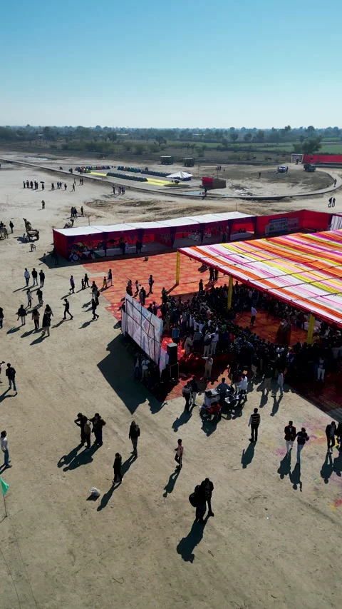 Aerial View Of Large Outdoor Event With Colorful Tents And Crowd Stock Footage 347124463