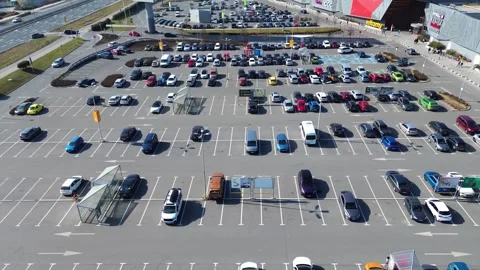 Aerial View of Large Parking Lot at Shopping Center Stock Footage 303672413
