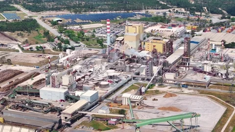 Aerial view of a large pulp and paper mill industrial plant Stock Footage 340312065